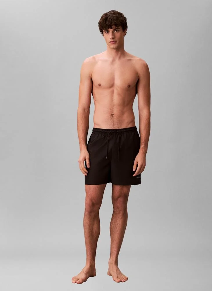 CALVIN KLEIN  Medium Drawstring Swim Shorts for Men | Best Price UAE